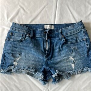 LILA RYAN Blue Jean Shorts with Distressing and Cut-Off Style